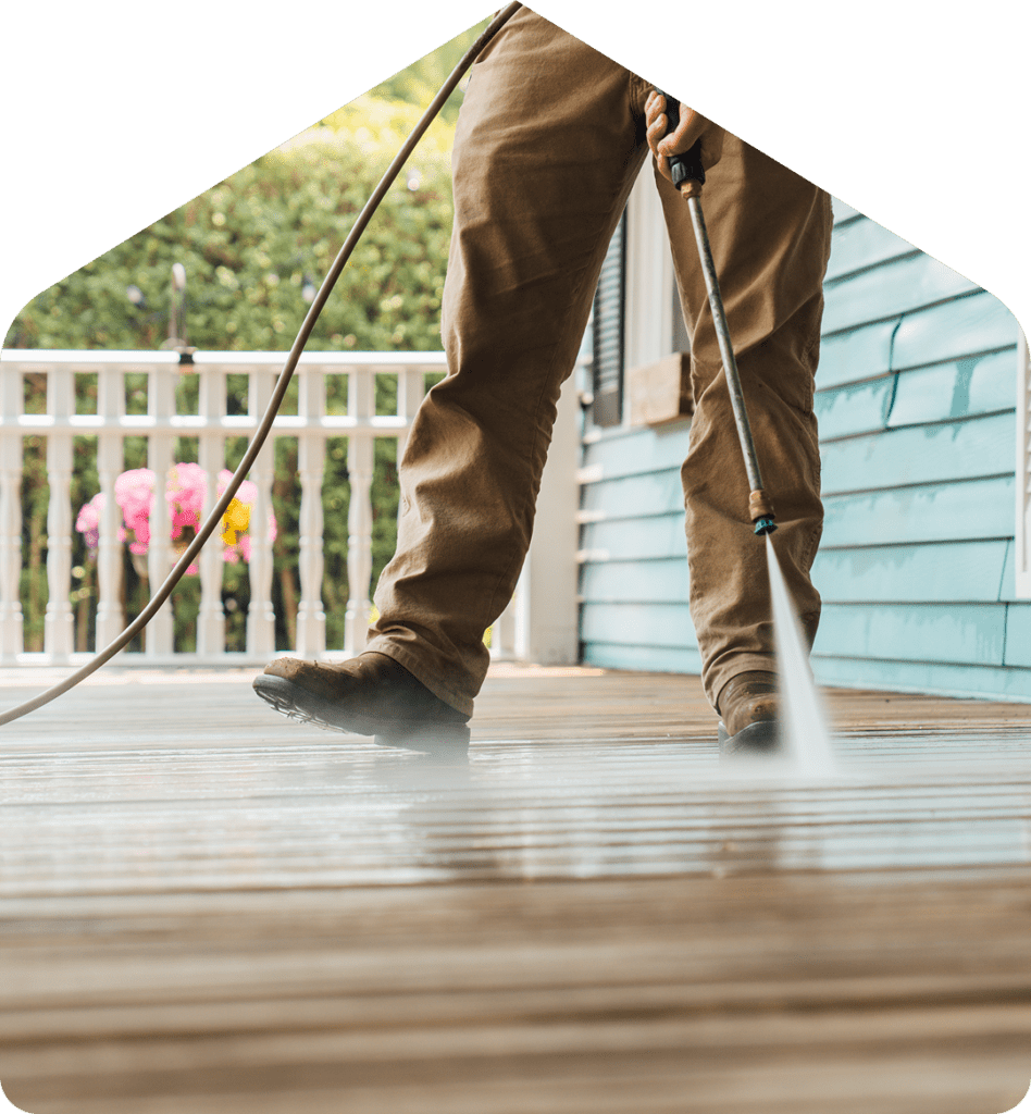 Pressure washing a patio deck