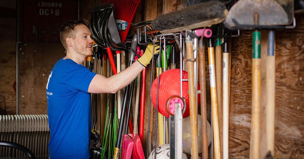 ma in shed with yard tools